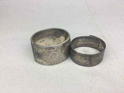 Lot 125 - A LOT OF TWO SILVER BANGLES