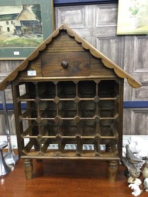 Lot 182 - A STAINED WOOD WINE RACK