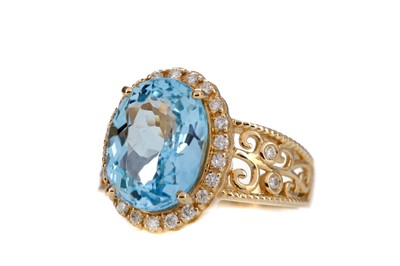 Lot 505 - A TOPAZ AND DIAMOND RING