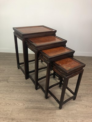 Lot 918 - A 20TH CENTURY CHINESE NEST OF FOUR TABLES