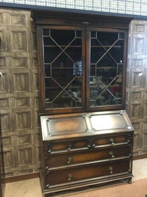 Lot 357 - AN EARLY 20TH CENTURY OAK BUREAU BOOKCASE