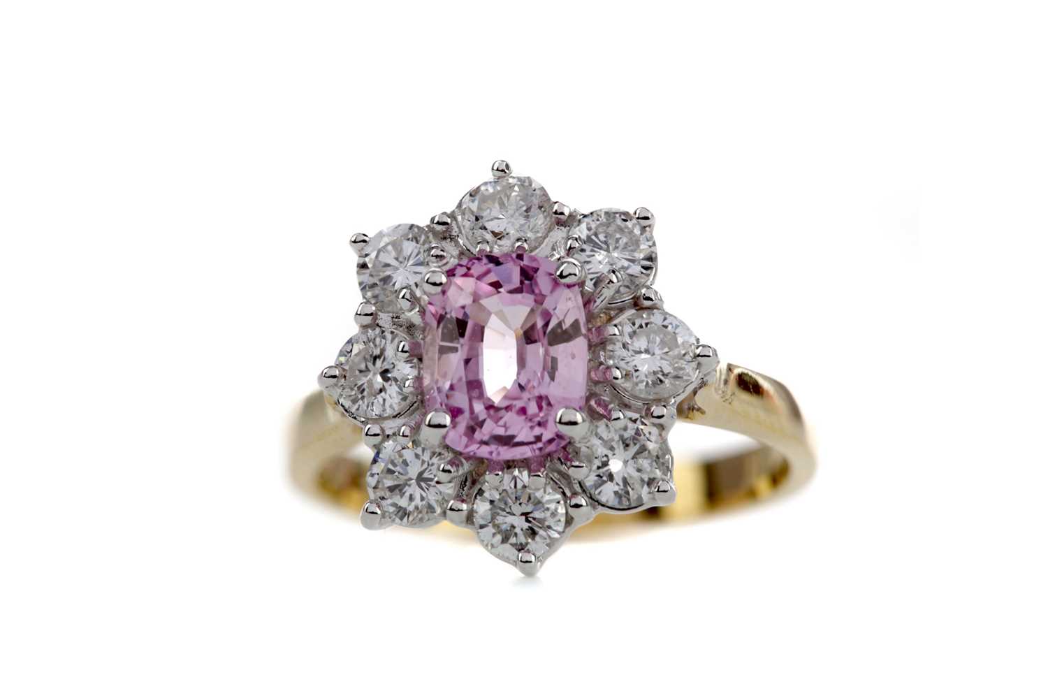 Lot 1441 - A PINK SAPPHIRE AND DIAMOND RING