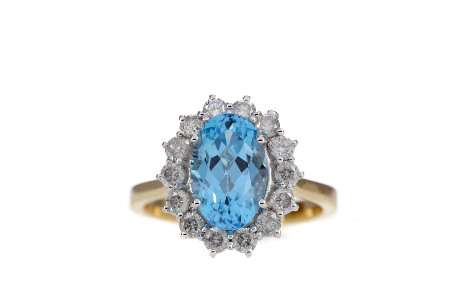 Lot 1454 - A BLUE TOPAZ AND DIAMOND CLUSTER RING