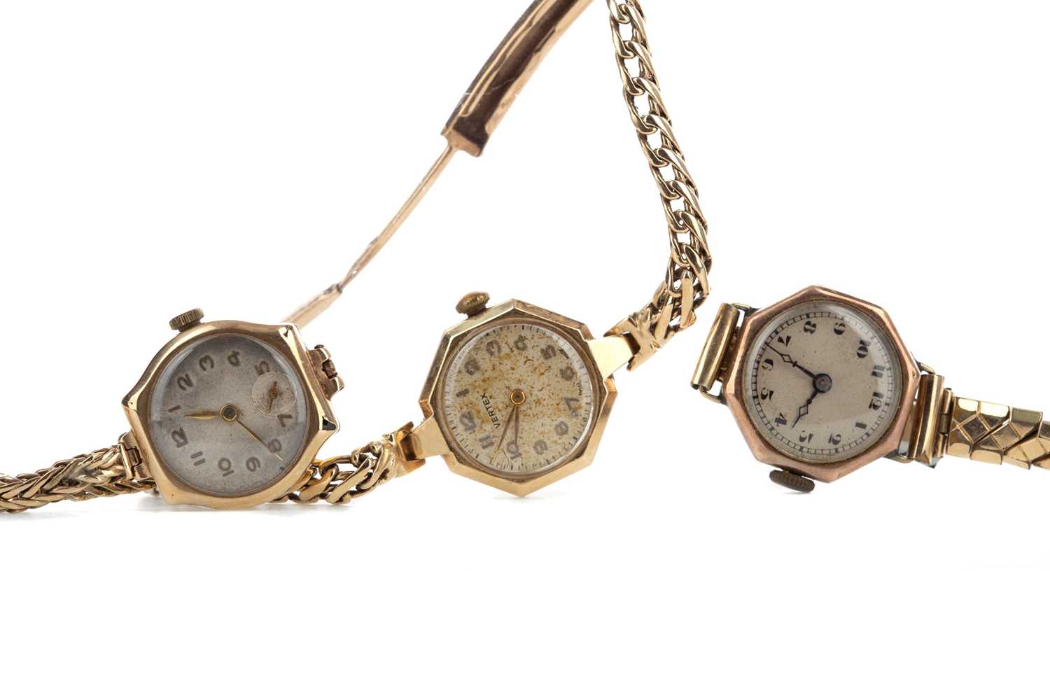 Lot 713 - THREE LADY'S GOLD CASED MANUAL WIND WRIST WATCHES