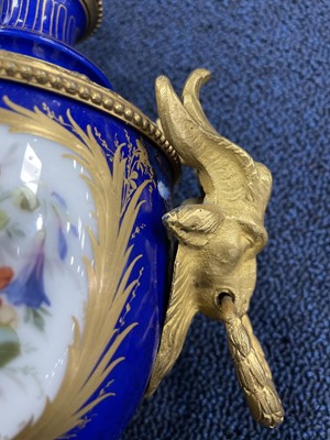 Lot 186 - A LATE 19TH CENTURY ORMOLU MOUNTED CONTINENTAL PORCELAIN VASE AND COVER
