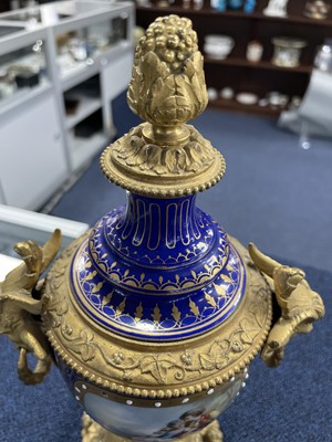 Lot 186 - A LATE 19TH CENTURY ORMOLU MOUNTED CONTINENTAL PORCELAIN VASE AND COVER
