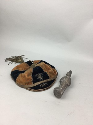 Lot 504 - A LATE 19TH CENTURY CAMBRIDGE UNIVERSITY SPORTING CAP AND A SHABTI