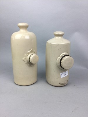 Lot 516 - A GOVANCROFT POTTERY STONEWARE HOT WATER BOTTLE, ANOTHER AND WOOD ITEMS