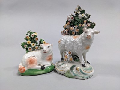 Lot 196 - A COLLECTION OF ELEVEN VICTORIAN STAFFORDSHIRE FIGURES OF SHEEP AND RAMS