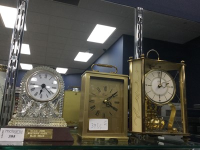 Lot 395 - A CUT GLASS MANTLE CLOCK, A CARRIAGE CLOCK AND AN ANNIVERSARY CLOCK