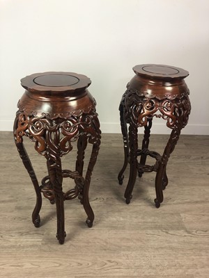Lot 928 - A PAIR OF 20TH CENTURY CHINESE HARDWOOD PLANT TABLES
