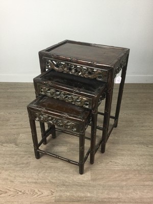 Lot 929 - AN EARLY 20TH CENTURY CHINESE NEST OF THREE TABLES