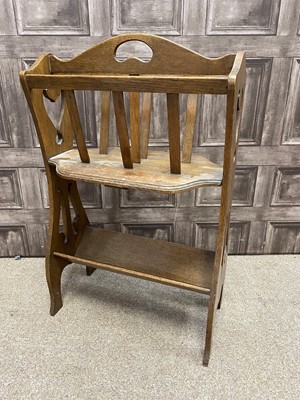 Lot 454 - AN OAK PAPER RACK