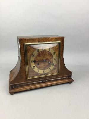 Lot 534 - AN OAK CASED MANTEL CLOCK