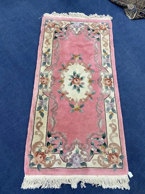 Lot 563 - A CHINESE RUG