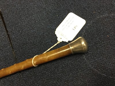 Lot 145 - A VICTORIAN WHITE METAL TOPPED CANE