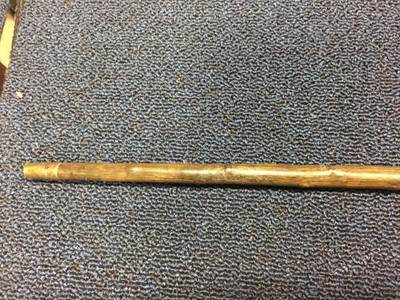 Lot 145 - A VICTORIAN WHITE METAL TOPPED CANE