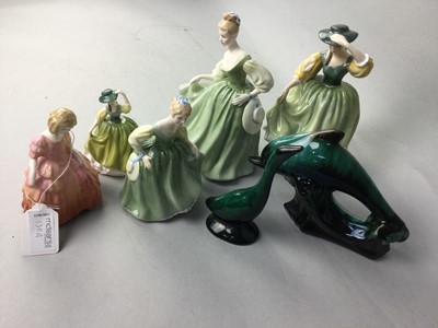 Lot 130A - A LOT OF FIVE ROYAL DOULTON FIGURES OF LADIES AND A DOLHPIN