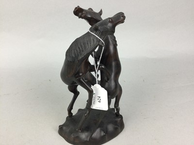 Lot 624 - A CARVED WOOD GROUP OF TWO HORSES