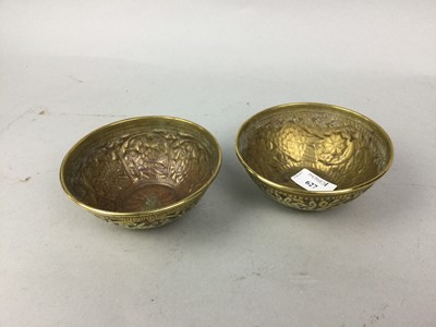 Lot 627 - A PAIR OF INDIAN BRASS BOWLS