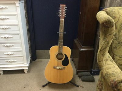 Lot 632 - A CARLTON ACOUSTIC GUITAR AND STAND