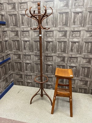 Lot 644 - A BENTWOOD STYLE CLOAK TREE AND A STOOL