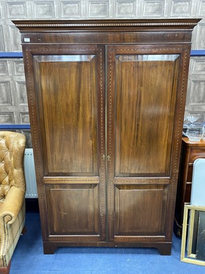 Lot 661 - A MAHOGANY TWO DOOR WARDROBE