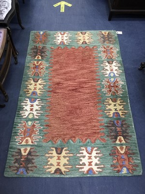 Lot 619 - A CHINESE PATTERNED RUG