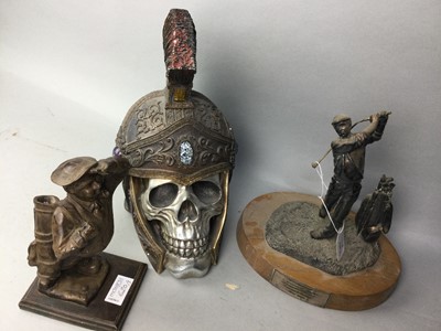 Lot 620 - A MODEL OF SKULL IN GLADIATOR HELMET, GOLFING TROPHY AND A GOLFING FIGURE