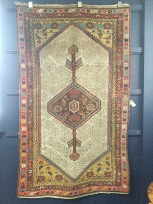 Lot 939 - A CAUCASIAN BORDERED RUG