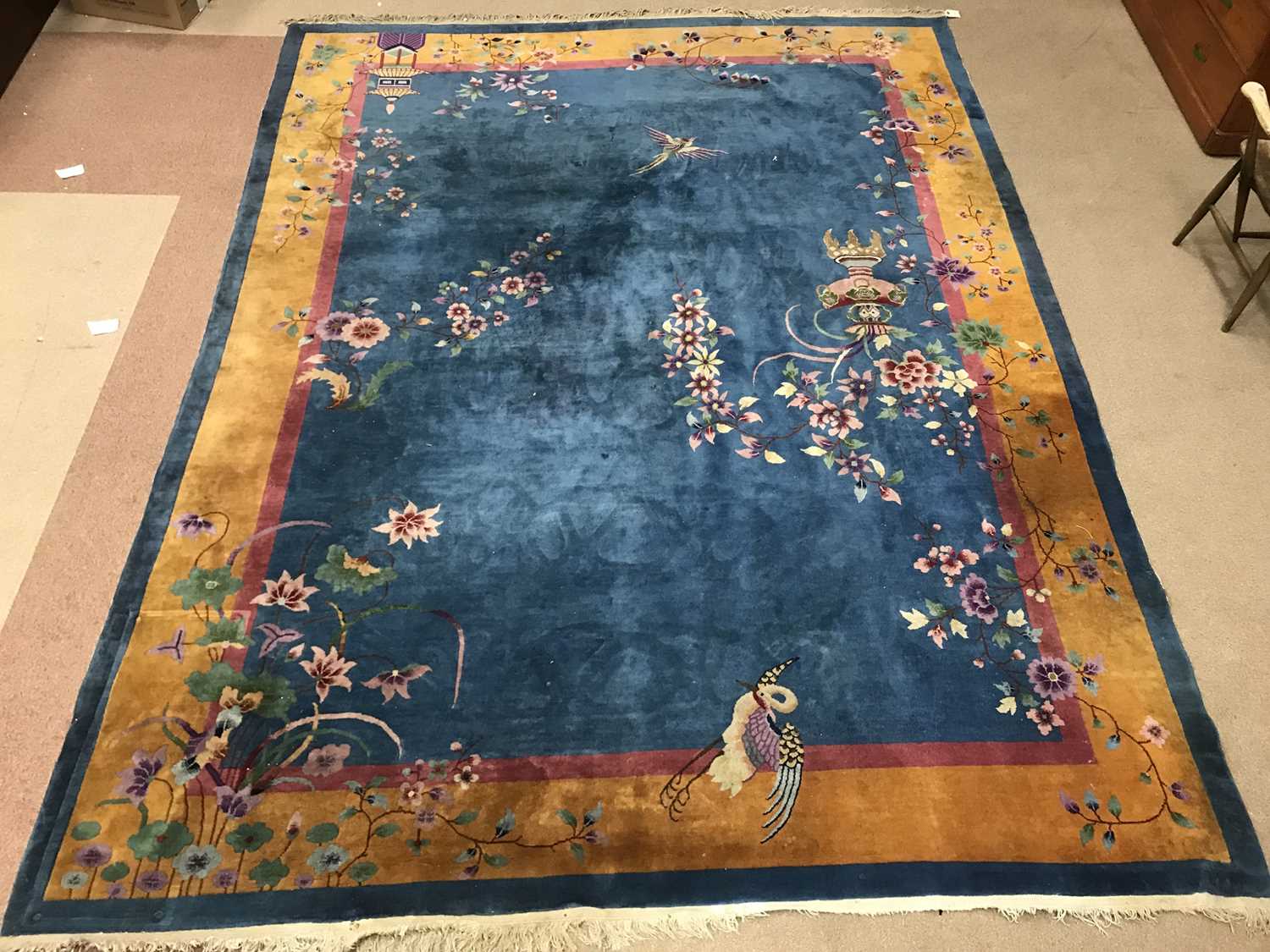 Lot 941 - A CHINESE BORDERED CARPET