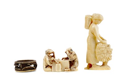 Lot 985 - A JAPANESE IVORY NETSUKE, AN IVORY CARVING OF A FEMALE AND A HORN RING