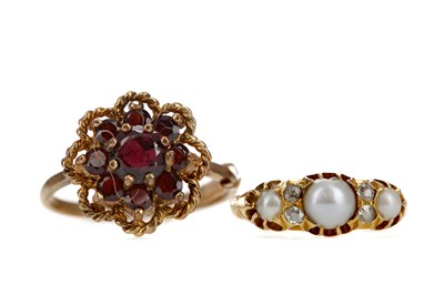 Lot 1511 - A PEARL AND DIAMOND RING AND A GARNET RING