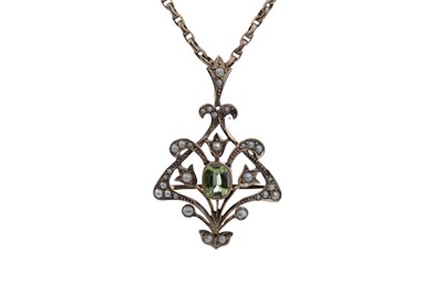 Lot 1515 - A PERIDOT AND SEED PEARL PENDANT ON CHAIN