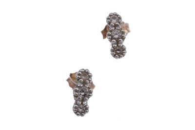 Lot 1504 - A PAIR OF DIAMOND THREE STONE EARRINGS