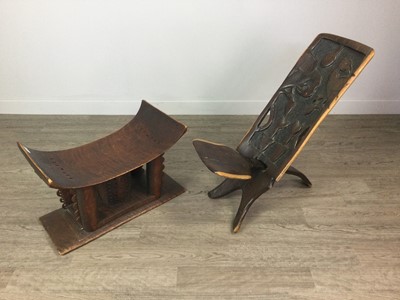 Lot 962 - AN AFRCIAN HARDWOOD FOLDING CHAIR AND A STOOL