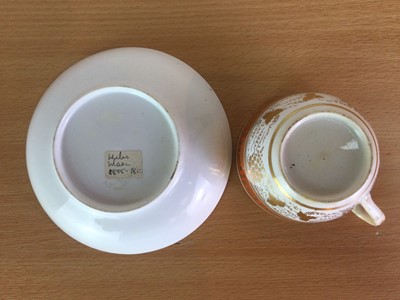 Lot 124 - AN EARLY 19TH CENTURY NEW HALL PORCELAIN TEACUP AND SAUCER, AND TWO OTHERS