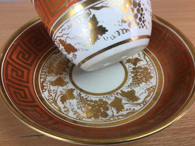 Lot 124 - AN EARLY 19TH CENTURY NEW HALL PORCELAIN TEACUP AND SAUCER, AND TWO OTHERS