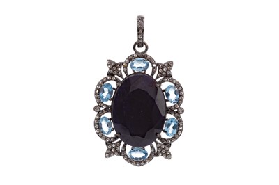 Lot 1523 - A SAPPHIRE AND TOPAZ PENDANT