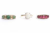 Lot 14 - THREE GOLD DRESS RINGS comprising an opal ring,...
