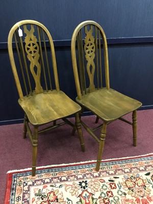 Lot 248 - A SET OF SIX ERCOL SPINDLE BACK DINING CHAIRS