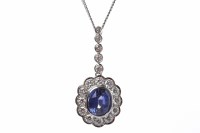 Lot 18 - IMPRESSIVE SAPPHIRE AND DIAMOND SET PENDANT...