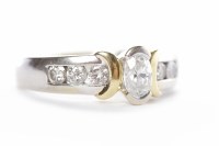 Lot 22 - UNUSUAL DIAMOND RING set with a central oval...