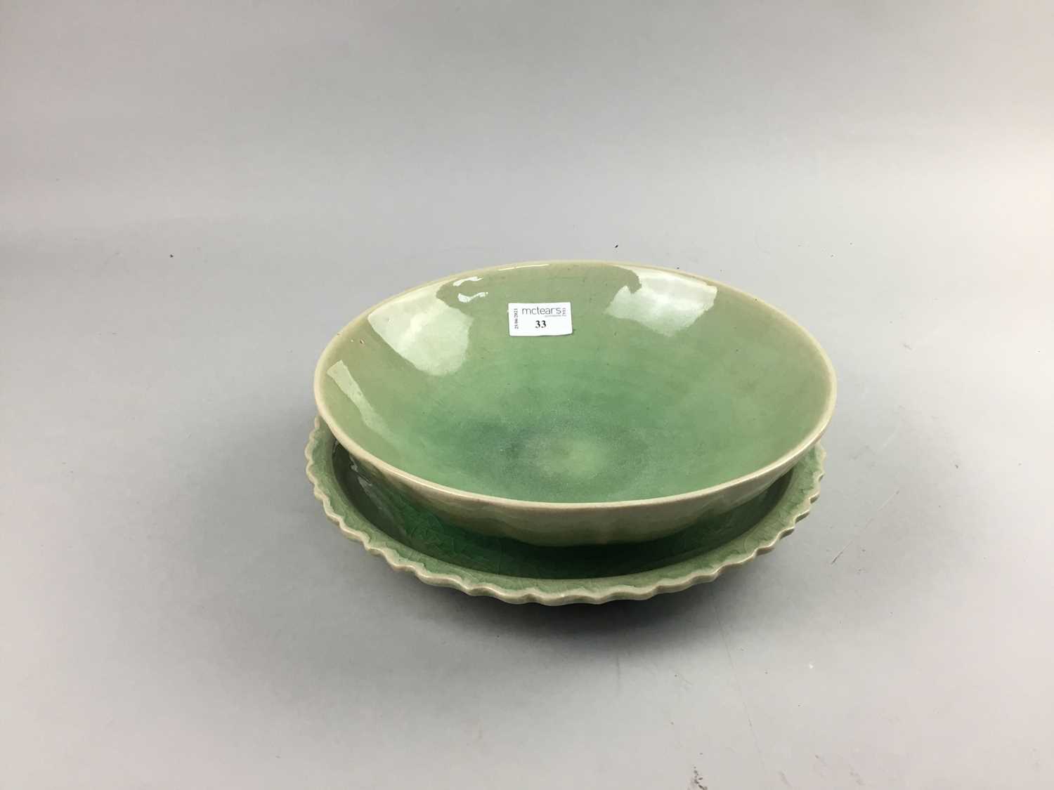 Lot 33 - A CHINESE CELADON PLATE AND BOWL