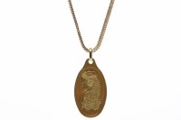 Lot 34 - SUISSE 10G FINE GOLD PENDANT of oval form, on...