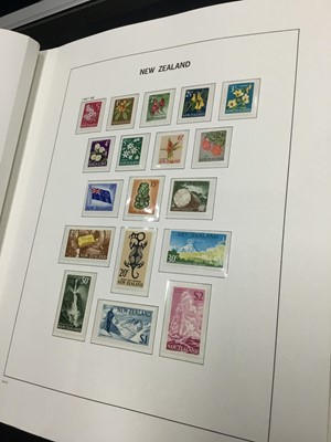 Lot 46 - A LOT OF FIVE FOLDERS OF AUSTRALIAN STAMPS ALONG WITH THREE FOLDERS OF NZ
