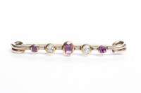 Lot 39 - EARLY TWENTIETH CENTURY RUBY AND DIAMOND BAR...
