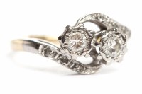Lot 42 - EARLY TWENTIETH CENTURY DIAMOND TWO STONE RING...