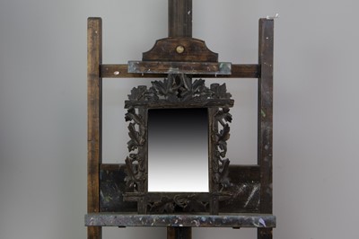 Lot 504 - AN EARLY 20TH CENTURY BLACK FOREST WALL MIRROR