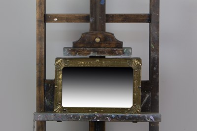 Lot 502 - A LATE 19TH CENTURY BRASS WALL MIRROR